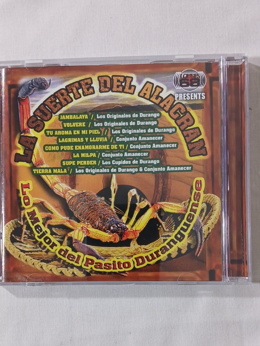 Lo Mejor del Pasito Duranguense - Suerte Del Alacrán (Yellow)